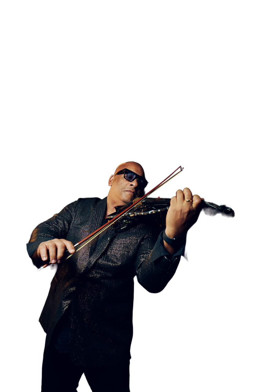 Julio Cuba playing electric violin on stage with dramatic lighting